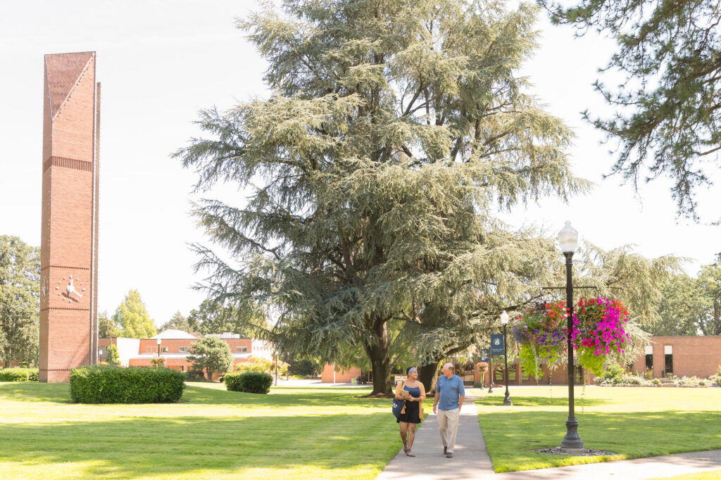 A photo of two seniors walking on campus