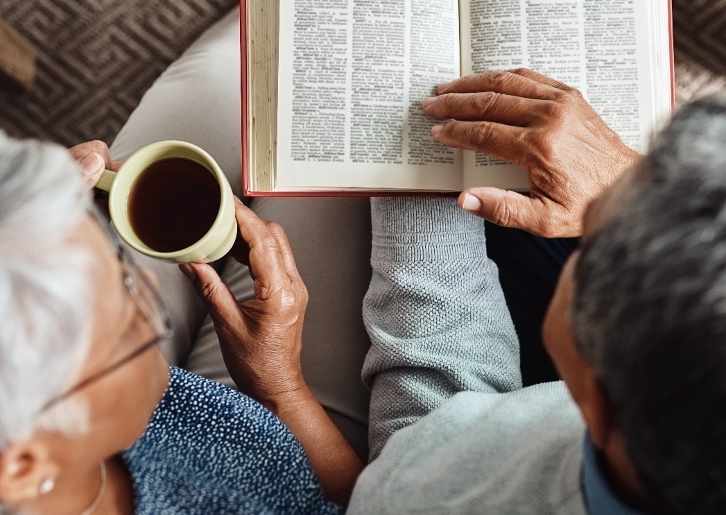 Senior couple studying the Bible